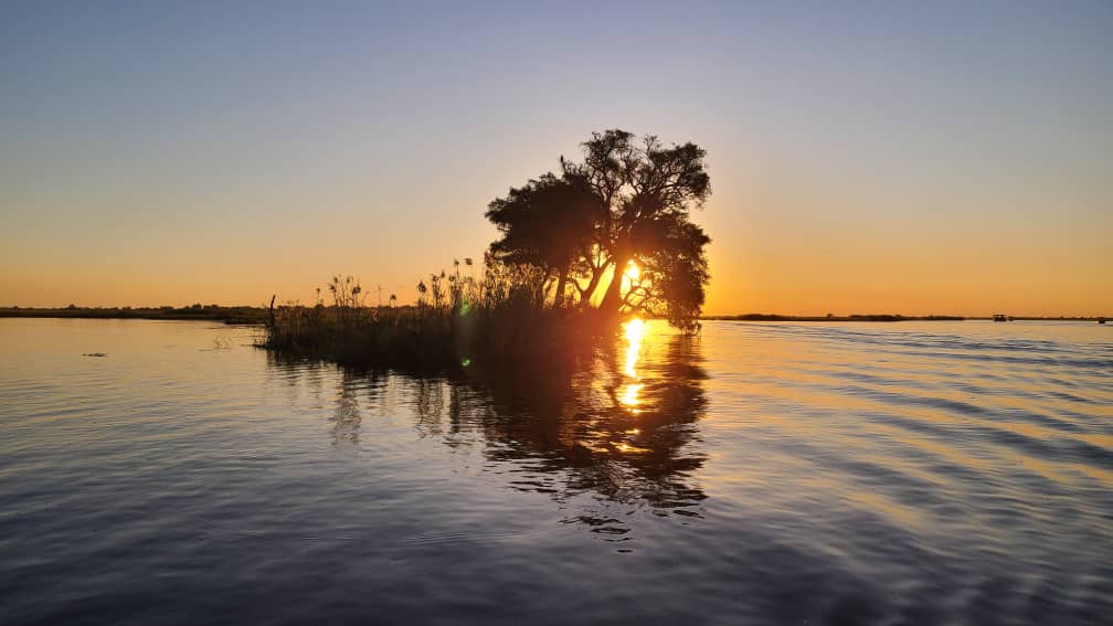 Sunset over an island on the Zambezi